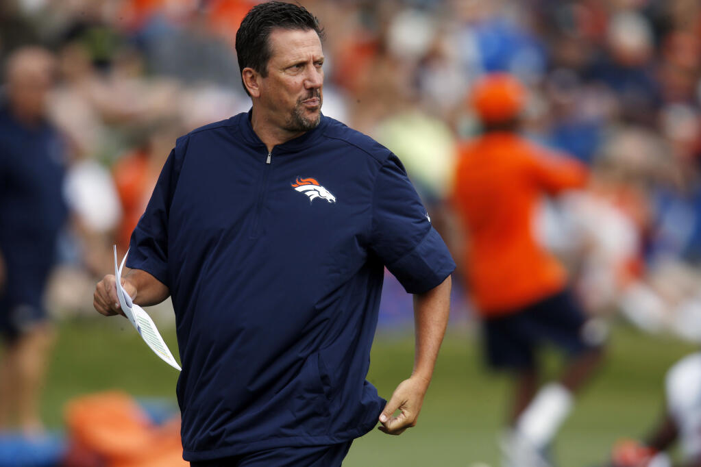 Then-Denver Broncos quarterbacks coach Greg Knapp takes part in drills during the team’s  training camp on Thursday, Aug. 4, 2016 in Englewood, Colorado. (David Zalubowski / ASSOCIATED PRESS)