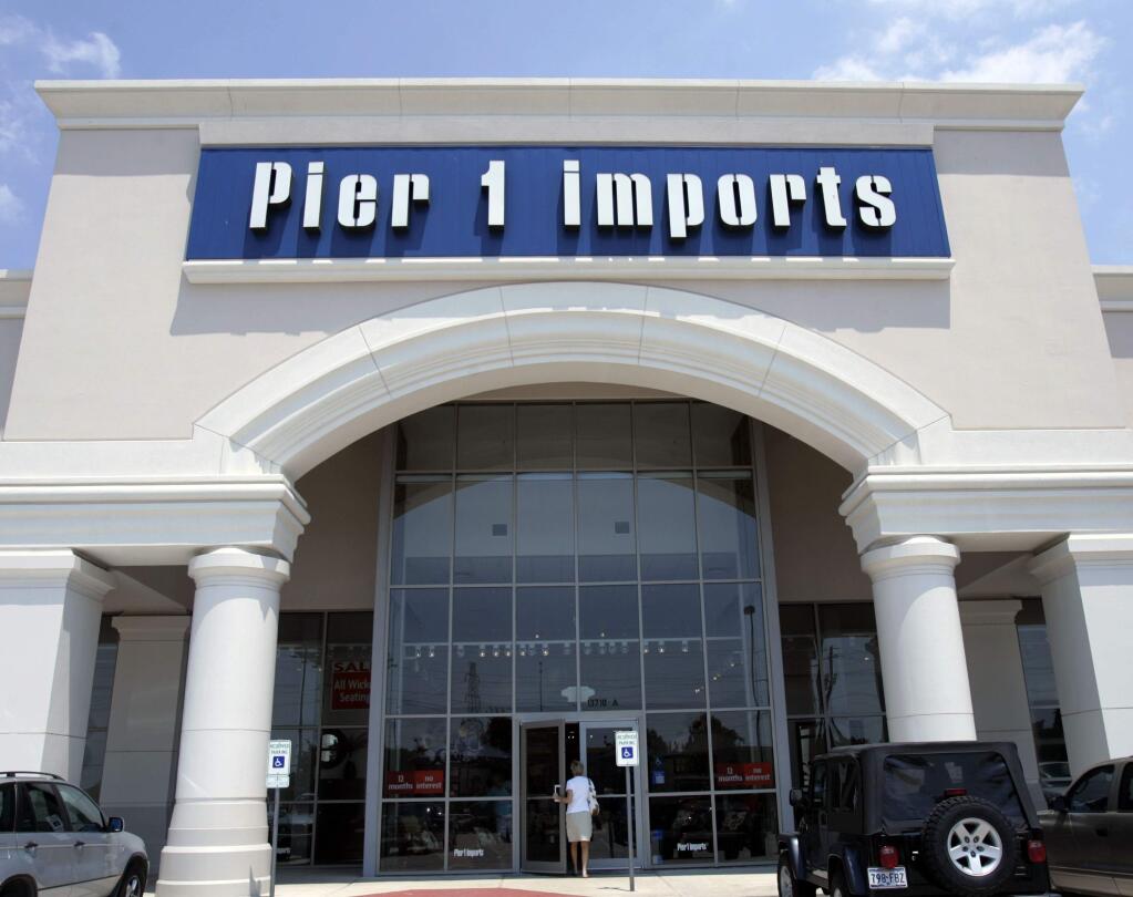 FILE - This June 15, 2005, file photo shows a Pier 1 Imports store in Dallas. Pier 1 Imports is closing nearly half its 942 stores as it struggles to draw consumers and compete online. The home decor company said Monday, Jan. 6, 2020, it is closing up to 450 stores and will also shutter distribution centers. It didn't say where the store closures would occur, but it operates stores in the U.S. and Canada. Pier 1 also plans layoffs at its corporate headquarters in Fort Worth, Texas. (AP Photo/Donna McWilliam, File)