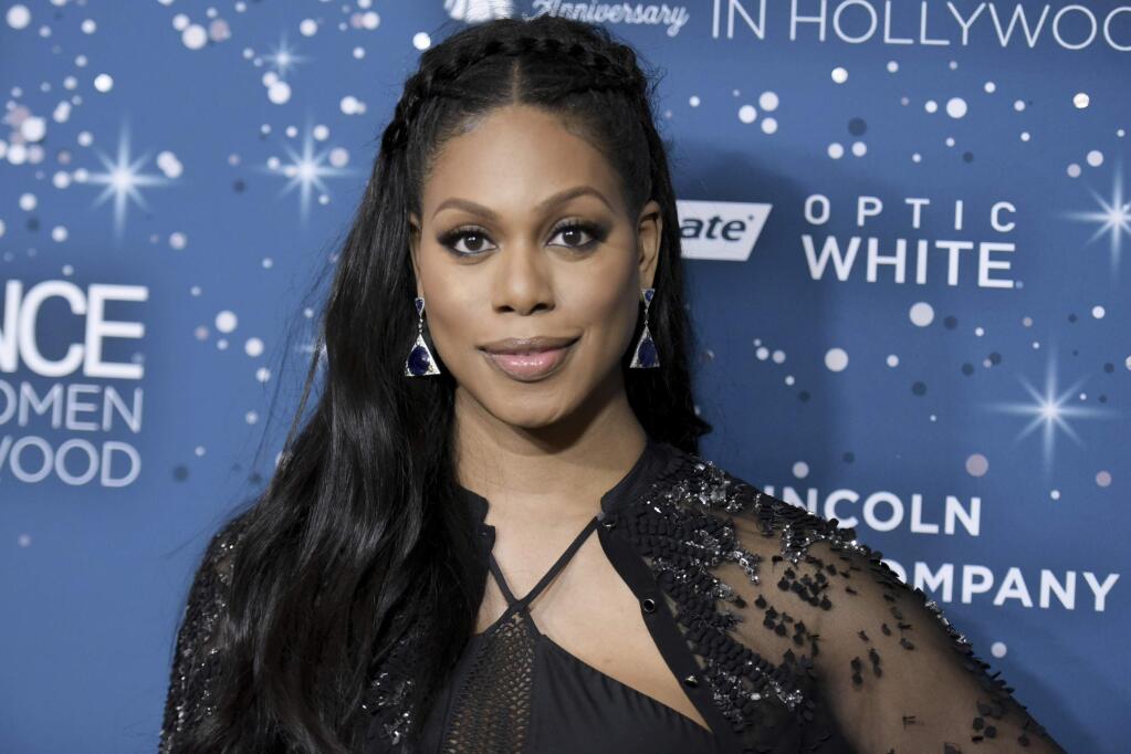 FILE - In this Feb. 23, 2017, file photo, Laverne Cox attends the 10th Annual Essence Black Women in Hollywood Awards ceremony in Beverly Hills, Calif. Variety and Deadline reported on March 7, 2017, that Cox would star on ABC pilot “The Trustee” as an ex-con alongside Meaghan Rath. (Photo by Richard Shotwell/Invision/AP, File)