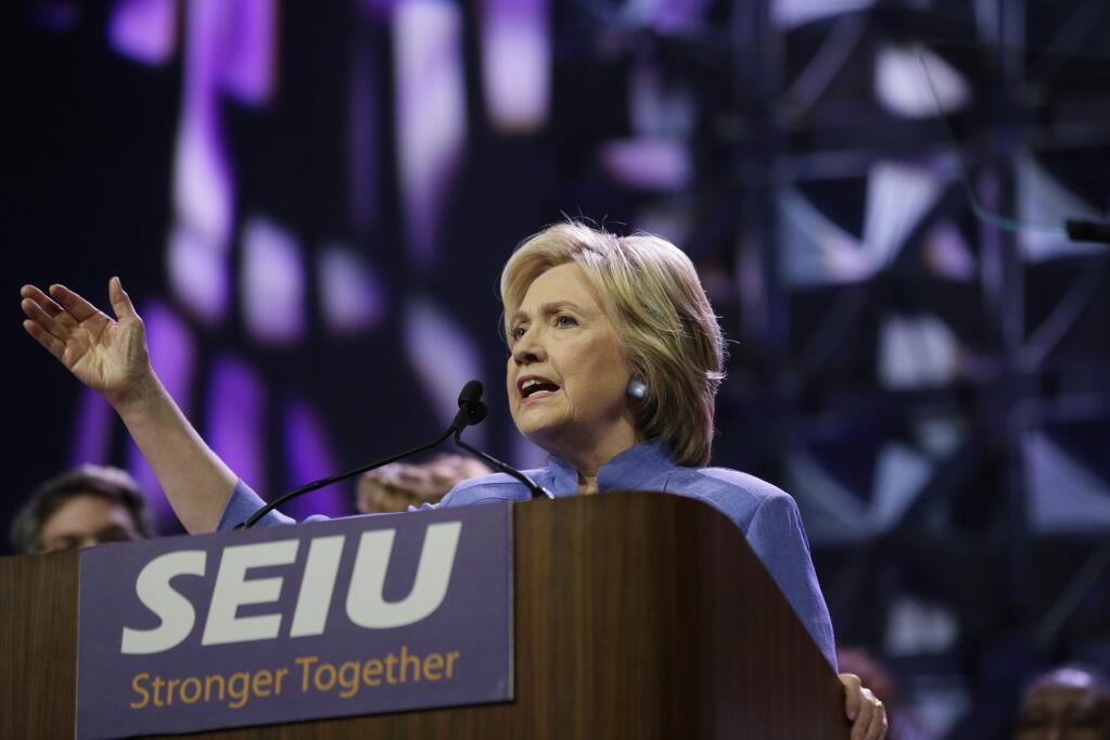 Democratic presidential candidate Hillary Clinton gestures while speaking to more than 3,000 Service Employees International Union (SEIU) members at the union's 2016 International Convention, Monday, May 23, 2016, in Detroit. (AP Photo/Carlos Osorio)