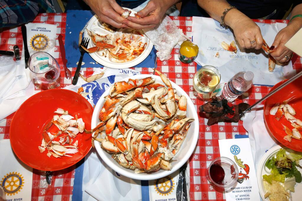 Guests dig into a feast of crab and all the fixings during the 31st annual Russian River Rotary Crab Feed in 2018. (The Press Democrat)