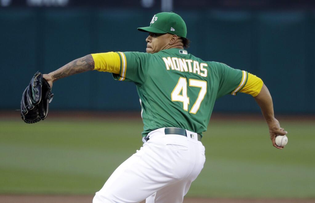 Oakland Athletics starting pitcher Frankie Montas throws against the Kansas City Royals during the first inning Friday, June 8, 2018, in Oakland. (AP Photo/Marcio Jose Sanchez)