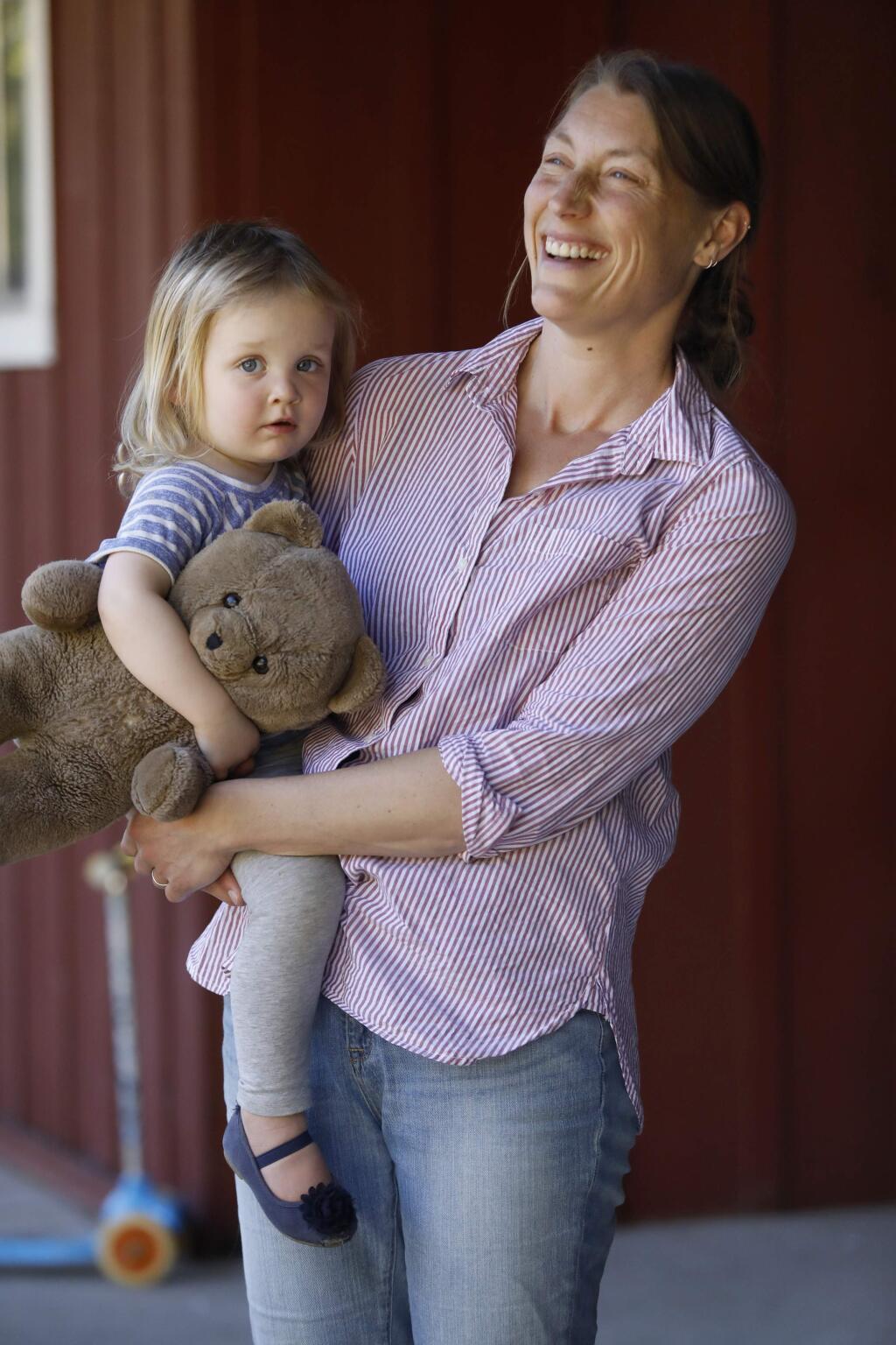 Nicole Spiridakis and her daughter Elsie Wallace, 2, at their home on Tuesday, November 6, 2018 in Sebastopol, California . (BETH SCHLANKER/The Press Democrat)