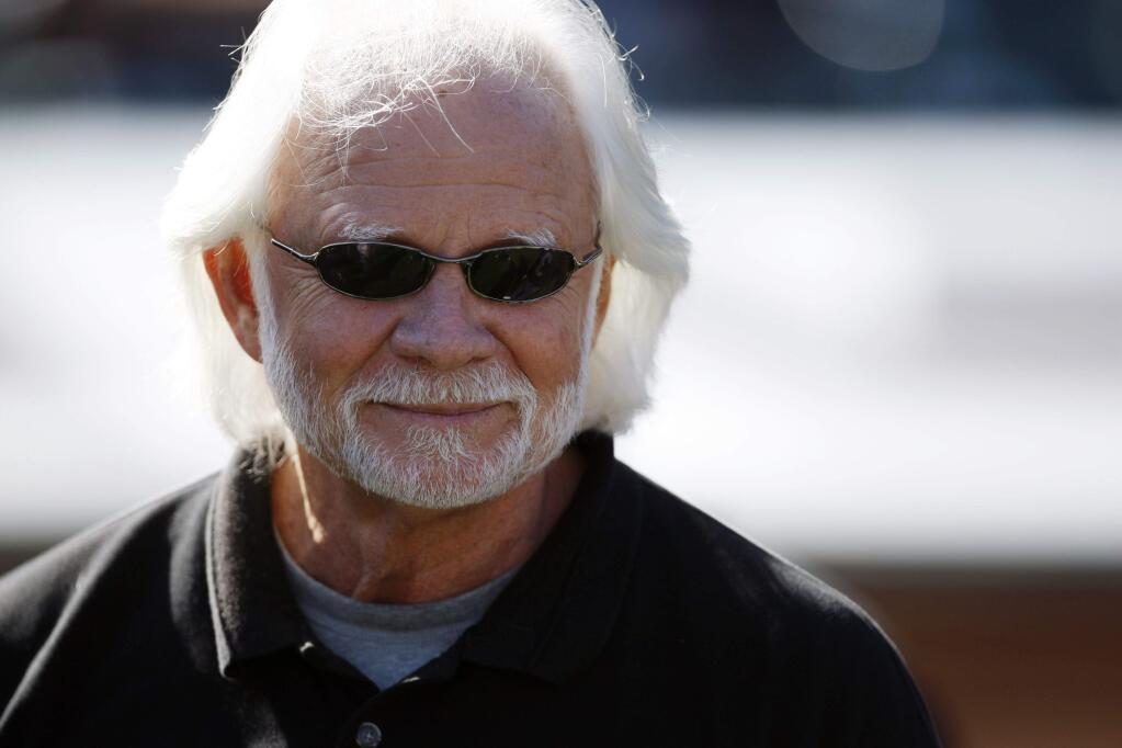 In this Sunday, Oct. 25, 2009 file photo, former Oakland Raiders quarterback Ken Stabler watches before a game between the New York Jets and the Oakland Raiders in Oakland. (AP Photo/Ben Margot, File)