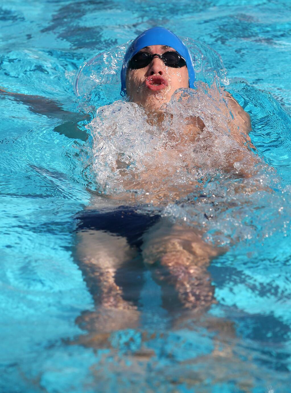 Analy's Josiah Miller swims the backstroke during the Men's 200 Yard Medley Relay during the Sonoma County League Swim Championship finals held at the Petaluma Swim Center, Friday, May 8, 2015. Analy came in second in the relay with Sonoma Valley winning. (Crista Jeremiason / The Press Democrat)