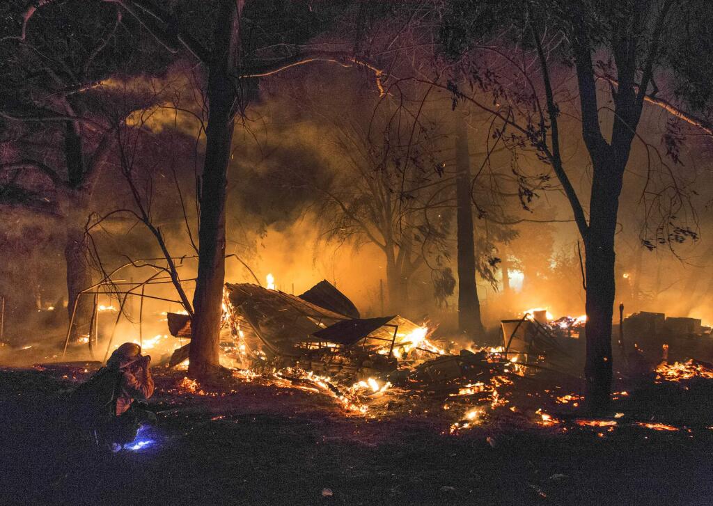 Three structures burned on Castle Road in the early morning hours of Saturday. Fire crews quickly had the flames under control. (Photo by Robbi Pengelly/Inex-Tribune)