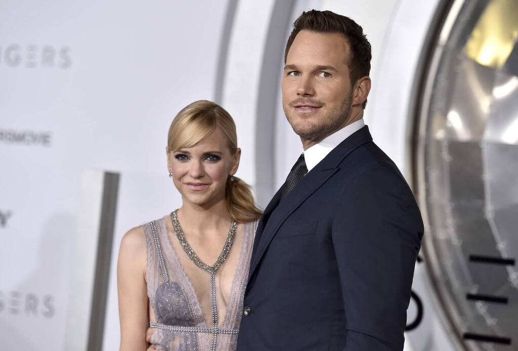 FILE- In this Dec. 14, 2016, file photo, Chris Pratt, right, and Anna Faris arrive at the Los Angeles premiere of 'Passengers'at the Village Theatre Westwood. Pratt and Faris have announced they are separating after eight years of marriage. The actors announced their breakup on social media Sunday, Aug. 6, 2017, in a joint statement confirmed by Pratt's publicist. (Photo by Jordan Strauss/Invision/AP, File)