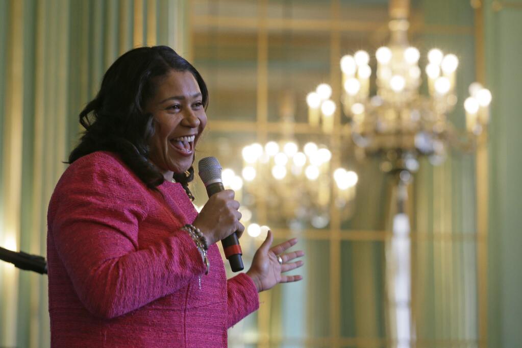 In this photo taken Friday, Nov. 1, 2019, San Francisco Mayor London Breed smiles while speaking at the annual Women In Construction Expo in San Francisco. (AP Photo/Eric Risberg)