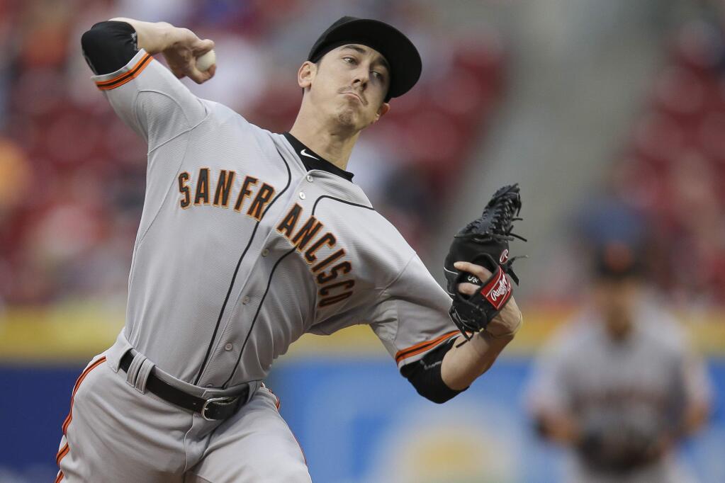 San Francisco Giants starting pitcher Tim Lincecum throws in the first inning of a game against the Cincinnati Reds, Thursday, May 14, 2015, in Cincinnati. (AP Photo/John Minchillo)