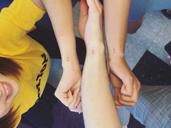 Selena Gomez, Alisha Boe and Tommy Dorfman show their semicolon tattoos they got together to both symbolize the end of filming '13 Reasons Why,' and struggles the co-stars went through in their personal lives. (INSTAGRAM / @alishaboe)