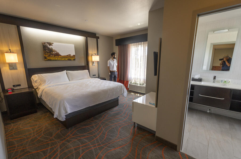 Holiday Inn Windsor owner Nick Desai Jr. in one of their deluxe king suites July 27, 2022. Sonoma County rented rooms at the hotel to provide shelter to homeless people and others who were vulnerable during the coronavirus pandemic. (John Burgess/The Press Democrat)