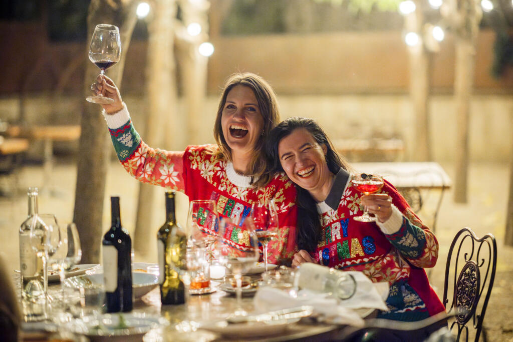 Winemaker Alice Sutro, left, of Sutro Wine Co. poses with Kaitlin Childers of Camp Rose Cellars. Sutro created the “Snatch That Wine List” guide to empower women to place restaurant wine orders. (Bryan Meltz)