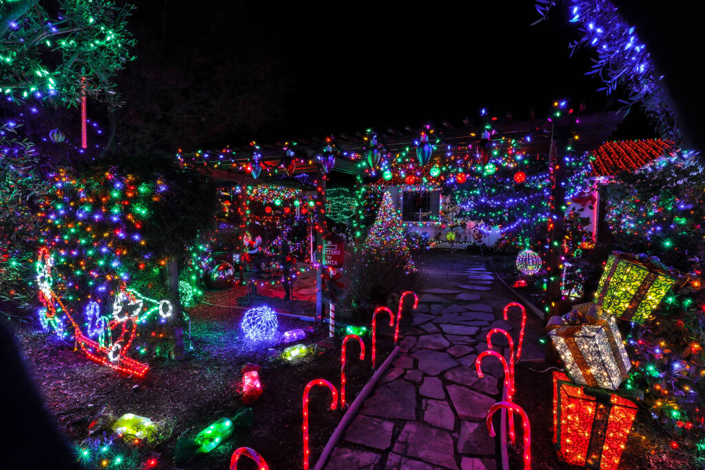 Barry and Arlene Weeks holiday lights on display at 6026 Elsa Avenue  in Rohnert Park, Sunday,  Dec. 6, 2020. (Will Bucquoy/For the Press Democrat)