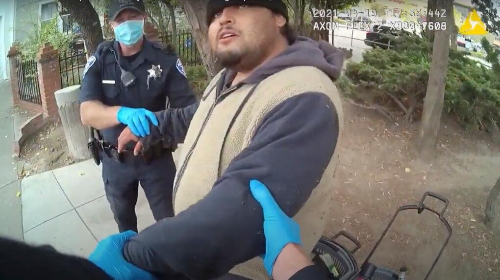 In this April 19, 2021, file image taken from Alameda Police Department body camera video, Alameda Police Department officers attempt to take Mario Gonzalez, 26, into custody, in Alameda, Calif. (Alameda Police Department via AP)