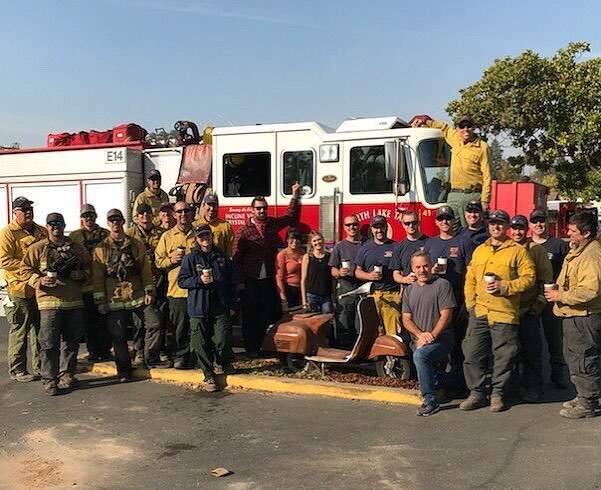 Mary's Pizza CEO Vince Albano poses with Lake Tahoe firefighters who were working to extinguish the Nun's Fire in Sonoma in October 2017.