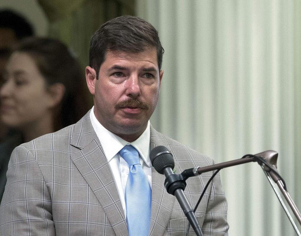 FILE - In this Aug. 15, 2016, file photo, Assemblyman Joaquin Arambula, D-Fresno, speaks at the Capitol in Sacramento, Calif. Arambula, charged with misdemeanor child cruelty, has denied ever hitting his daughters. The Fresno Bee reports that Arambula testified Tuesday, May 14, 2019, he spanked his 7-year-old daughter twice on the buttocks one evening in December. Prosecutors say he squeezed and hit his daughter on the face, leaving a bruise from his wedding ring. (AP Photo/Rich Pedroncelli, File)
