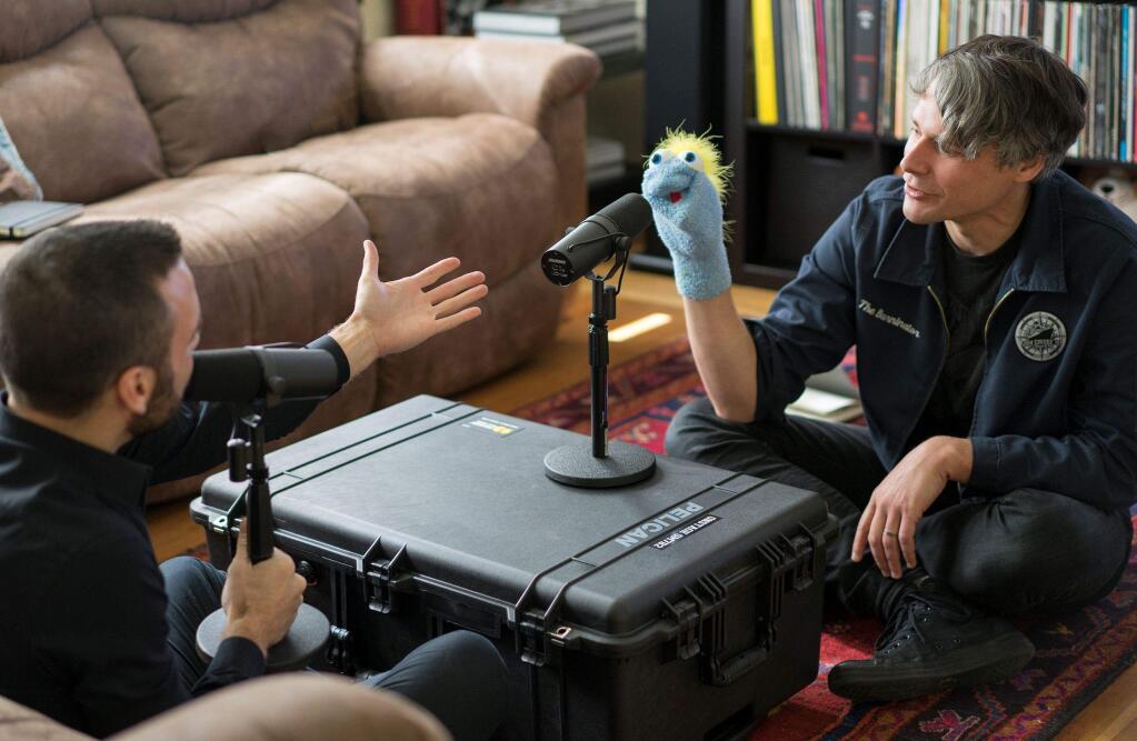 Jim Agius (of Petaluma Market, Dogfilm Productions, Phoeniz Theater boardmember), with Gio Benedetti and 'puppet correspondent' Rocco Blastorius. (PHOTO BY ERIC MOLYNEAUX)