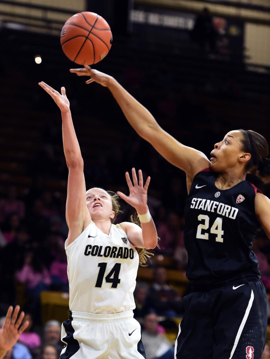 Colorado's Kennedy Leonard shoots past Stanford's Erica McCall during the first half of an NCAA college basketball game Friday, Feb. 19, 2016, in Boulder, Colo. (Cliff Grassmick/The Daily Camera via AP)