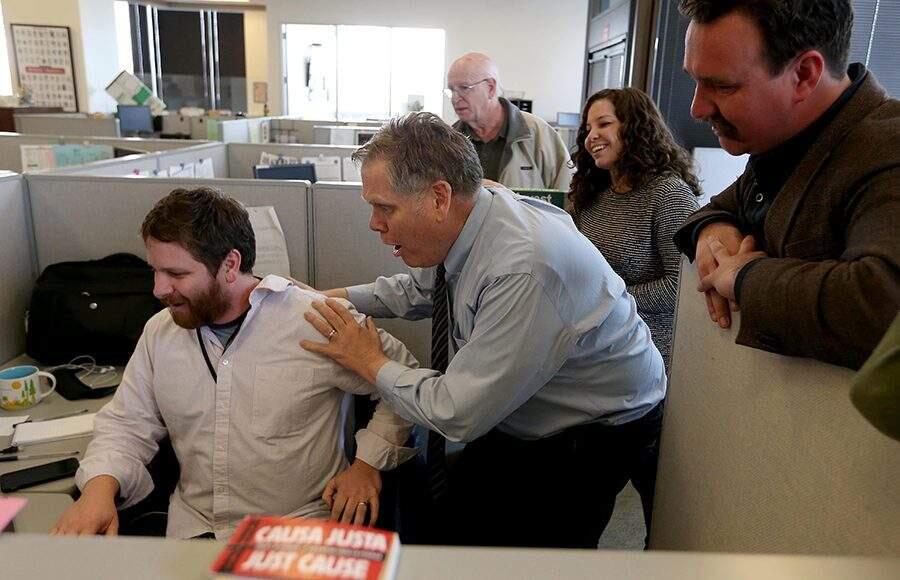East Bay Times reporters Matthias Gafni, Thomas Peele, Harry Harris, Erin Baldassari and David Debolt react as they learn of their Pulitzer Prize win for breaking news at their office in downtown Oakland, Calif., on Monday, April 10, 2017. The staff of the East Bay Times won journalism's highest honor for their coverage of the tragic Ghost Ship warehouse fire which killed 36 people in December 2016. (Jane Tyska/Bay Area News Group)