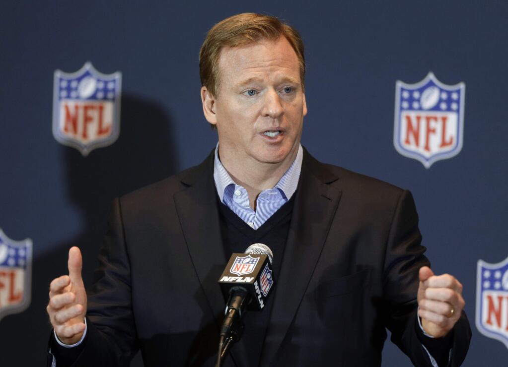 In this March 26, 2014, file photo, NFL Commissioner Roger Goodell answers questions during a news conference in Orlando, Fla. (AP Photo/John Raoux, File)