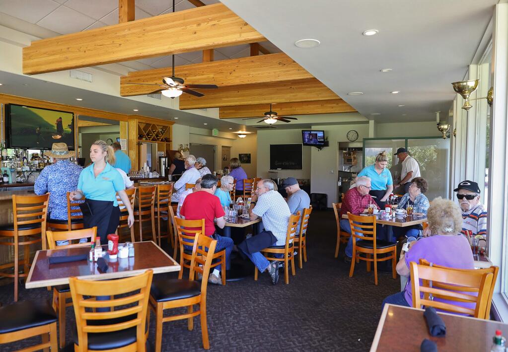 The dining room at Quail Inn Restaurant and Bar at Oakmont Golf Club on Monday, July 22, 2019. (Christopher Chung/ The Press Democrat)
