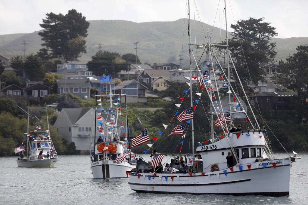 Boats take part in the Blessing of the Fleet boat parade in the Bodega Bay, on Sunday, April 15, 2018. (BETH SCHLANKER/ The Press Democrat)