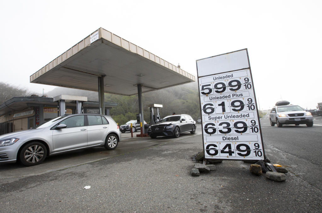 Gas prices at the Jenner “C” Store on the Sonoma Coast in Jenner greet travelers on Highway 1, Tuesday March 15, 2022. (Chad Surmick / The Press Democrat)