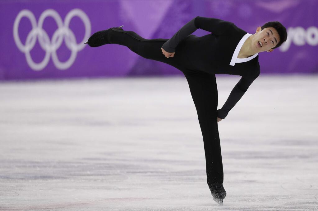Nathan Chen of the United States performs during the men's free figure skating final in the Gangneung Ice Arena at the 2018 Winter Olympics in Gangneung, South Korea, Saturday, Feb. 17, 2018. (AP Photo/David J. Phillip)