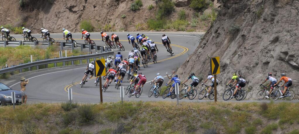 The peloton rides through tight turns during Stage 2 of the AMGEN Tour of California Monday, May 14, 2018, in Ojai, Calif. (AP Photo/Mark J. Terrill)