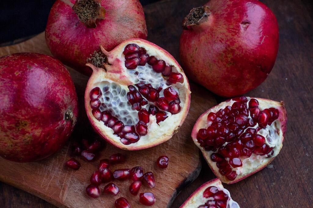 Fresh pomegranates are both beautiful and delicious; a salad is an easy way to enjoy them.