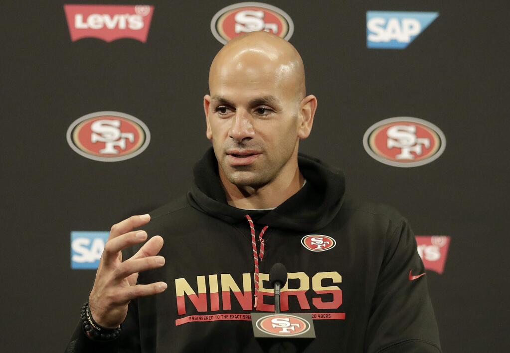 San Francisco 49ers defensive coordinator Robert Saleh speaks to reporters after a practice in Santa Clara, Wednesday, May 30, 2018. (AP Photo/Jeff Chiu)