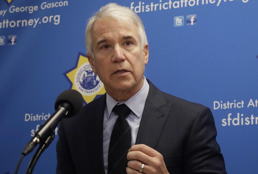 San Francisco District Attorney George Gascon speaks at news conference in San Francisco, Wednesday, Feb. 21, 2018. Gascon says he will seek $1 million to help curtail car break-ins in the city, which last year recorded more than 30,000 auto burglaries. (AP Photo/Jeff Chiu)