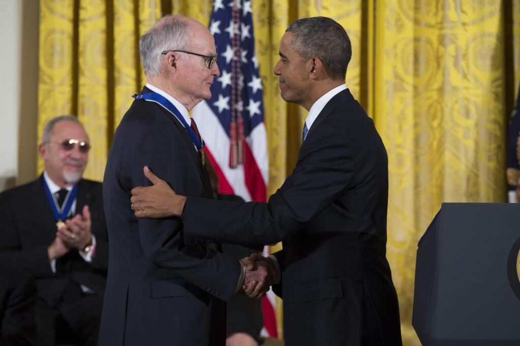 In this Nov. 24, 2015, file photo, President Barack Obama, right, shakes hands with former head of the EPA and director of the FBI William Doyle Ruckelshaus, after presenting him with the Presidential Medal of Freedom during a ceremony in the East Room of the White House in Washington. Ruckelshaus, who famously quit his job in the Justice Department rather than carry out President Richard Nixon's order to fire the special prosecutor investigating the Watergate scandal, has died. He was 87. The EPA confirmed his death in a statement Wednesday, Nov. 27, 2019. (AP Photo/Evan Vucci)