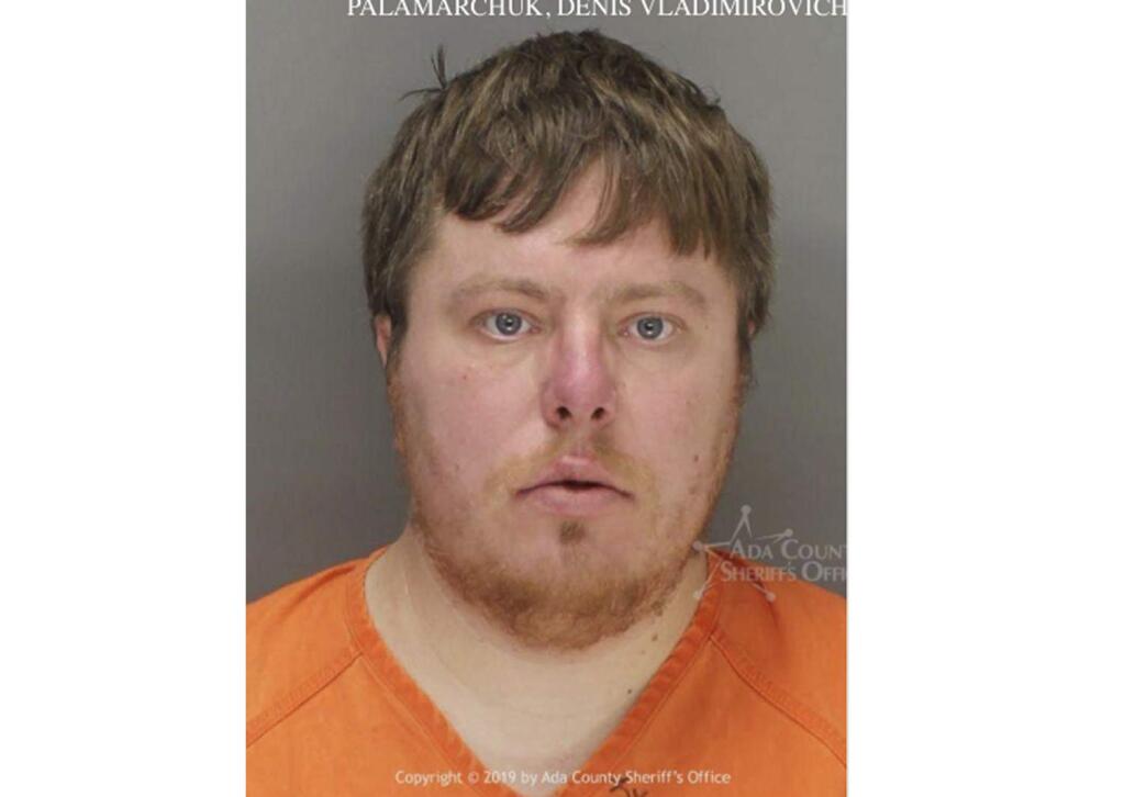 This undated booking photo provided by the Ada County, Idaho Sheriff's Office shows Denis Palamarchuk, 33, who was arrested Jan. 24, 2019, after the Idaho State Police stopped him at an inspection. Palamarchuk said he was hauling legal industrial hemp, but Idaho authorities have charged him with felony drug trafficking for transport of marijuana. (The Ada County Sheriff's Office via AP)