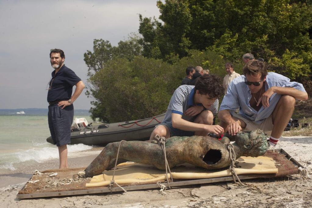 This image released by Sony Pictures Classics shows, from left, Michael Stuhlbarg, Timothee Chalamet and Armie Hammer in a scene from 'Call Me By Your Name.' The film was nominated for an Oscar for best picture on Tuesday, Jan. 23, 2018. The 90th Oscars will air live on ABC on Sunday, March 4. (Sony Pictures Classics via AP)