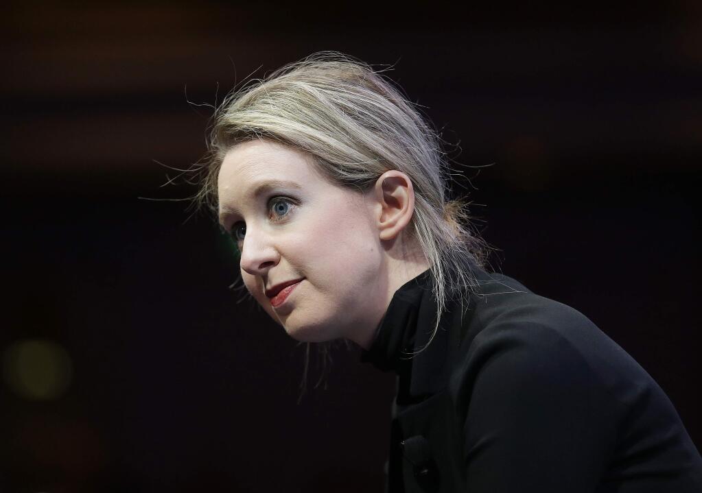 FILE- In this Nov. 2, 2015, file photo, Elizabeth Holmes, founder and CEO of Theranos, speaks at the Fortune Global Forum in San Francisco. (AP Photo/Jeff Chiu, File)