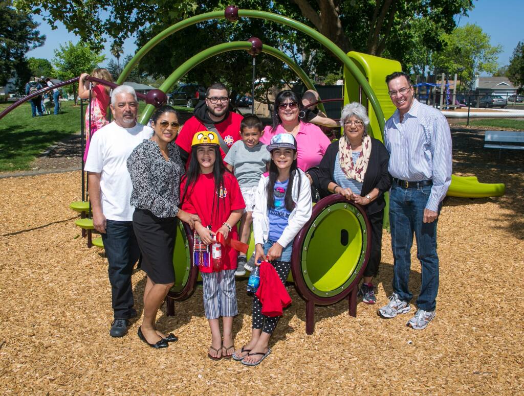 The Federated Indians of Graton Rancheria donated new playground equipment for Eagle Park within Rohnert Park. Shown are tribal council members and children with Tribal Chairman Greg Sarris.