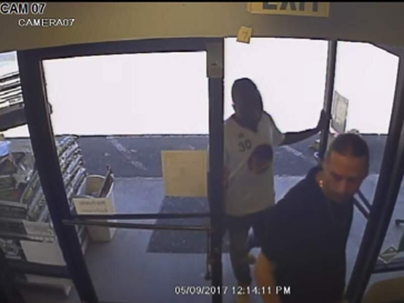 A security camera at Lovie's Garden Supply in Middletown captures two suspects accused of using a forged credit card to purchase $1,500 worth of merchandise on May 9, 2017. (Lake County Sheriff's Office)