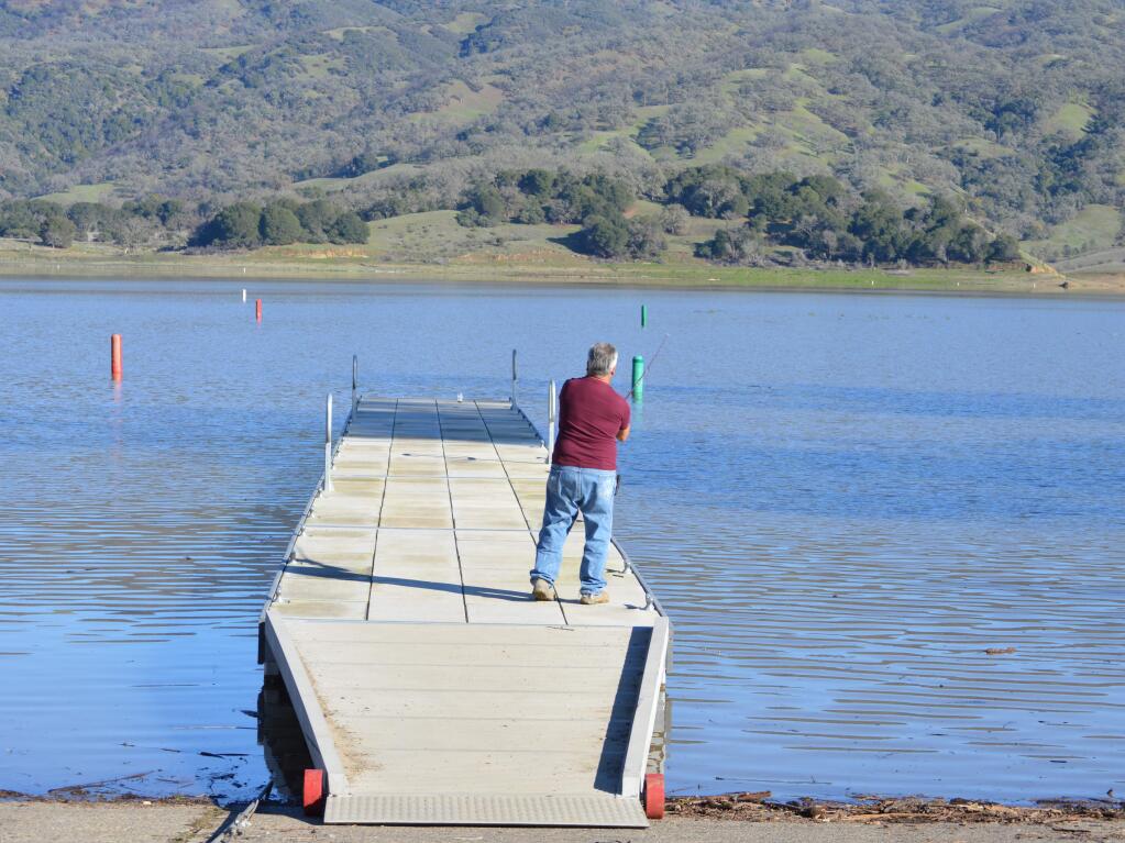 Guadalupe Lopez, visiting from Arizona, casts for bass Friday from the south boat ramp at Lake Mendocino.