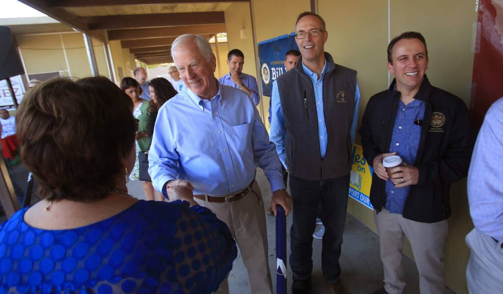 Congressmen Mike Thompson, from left, Jared Huffman and Assemblymember Marc Levine attend the annual Labor Day pancake breakfast at the Carpenters Labor Center in Santa Rosa, Monday Sept. 5, 2016. (Kent Porter / The Press Democrat) 2016