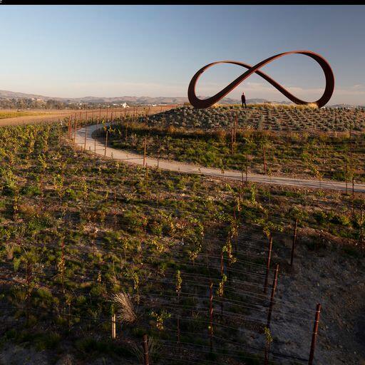 “Infinity” sculpture is featured at the highest point of the 700-acre Stanly Ranch property in Napa. The goal was to reflect the Stanly Ranch design principles of beautiful simplicity, understated luxury and seamless integration with the unique Napa Valley setting. As the material gains its rust-colored patina, it will aesthetically homogenize the sculpture with the natural surroundings of the site. (Courtesy of Gordon Huether Studio)