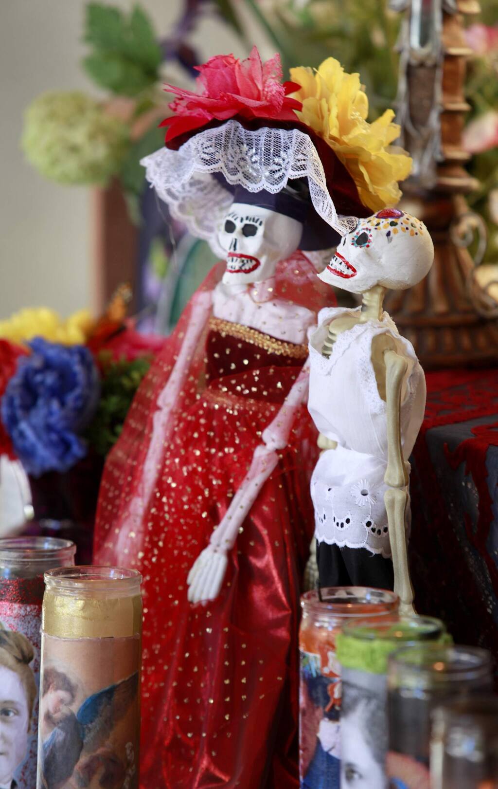 Skeletons decorate an altar during a Dia de los Muertos celebration at Old Courthouse Square in Santa Rosa on Sunday, Nov. 2, 2014. (BETH SCHLANKER/ PD FILE)