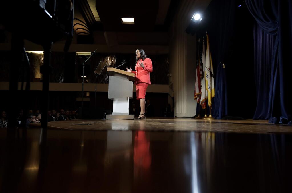 San Francisco Mayor London Breed delivers the state of the city address in San Francisco, Wednesday, Jan. 30, 2019. Breed swiped at the White House in her first state of the city address, saying that the city would protect transgender and immigrant rights. (AP Photo/Jeff Chiu)