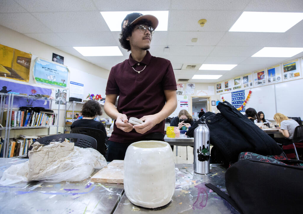 Student Rafael Maya works on his project In a ceramics class at Creekside High School on Friday, Dec. 9, 2022. (Robbi Pengelly/Index-Tribune)