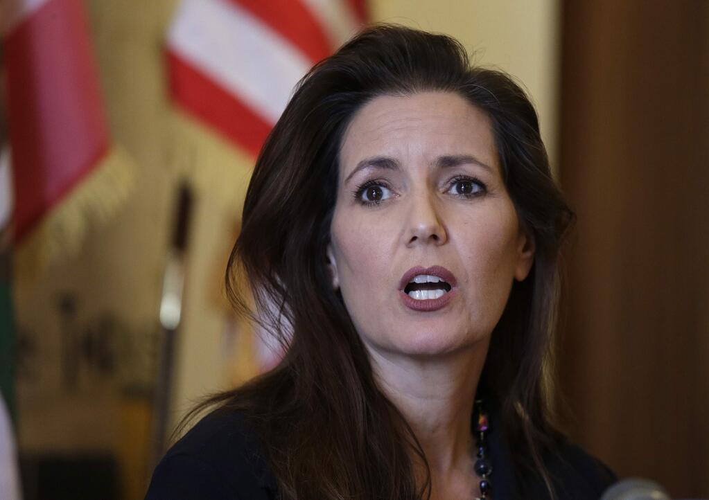 FILE - In this June 15, 2016, file photo Oakland Mayor Libby Schaaf answers questions during a news conference at City Hall in Oakland, Calif. Schaaf warned over the weekend of Feb, 24, 2018, that federal agents were planning immigration raids across the San Francisco Bay Area. Though no major immigration sweeps have materialized, Schaaf said it was her 'ethical obligation' to issue the warning. (AP Photo/Eric Risberg, File)