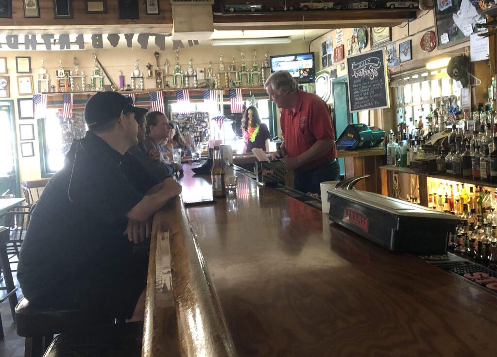 Bartender Kirk Furlong chats with customers at the Willowbrook Ale House.(PHOTO BY DAVID TEMPLETON)
