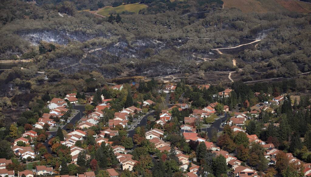 The Kincade fire burned through Foothill Regional Park and directly impacted homes in the Foothill Oaks Estates in Windsor. From left is Buena Tierra Court, Cayetano Court and LaQuinta Court, Monday, Nov. 4, 2019. (Kent Porter / The Press Democrat)