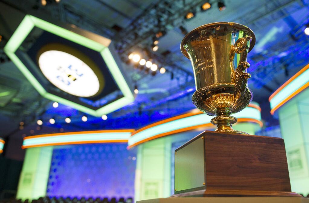 The winner's trophy sits onstage as the preliminary round two of the Scripps National Spelling Bee starts, in National Harbor, Md., Wednesday, May 25, 2016. (AP Photo/Cliff Owen)