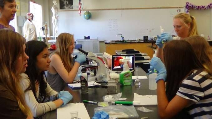 Petaluma High School students prepare their science experiment for launch to the International Space Station. (COURTESY PHOTO)