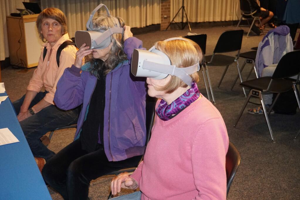 Sonoma County Library patrons try out new virtual reality headsets. KAT GORE